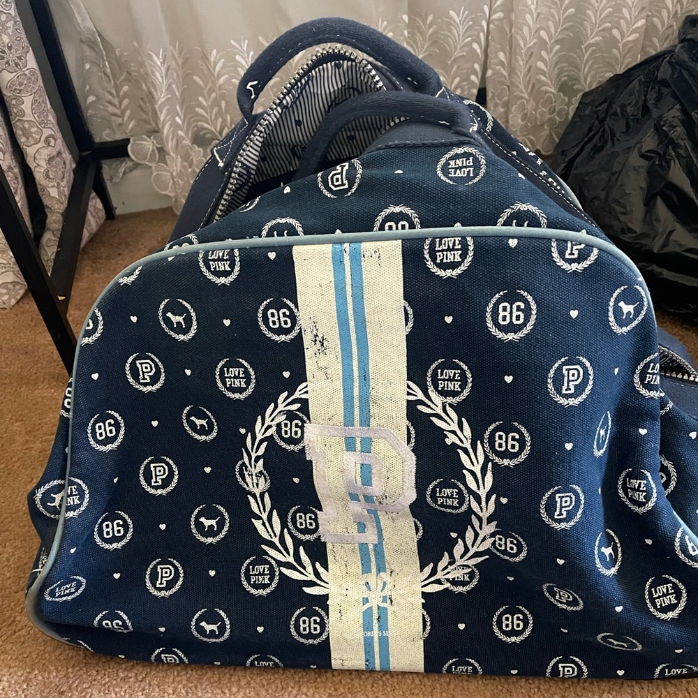 Victoria Secret Pink Rolling Bag